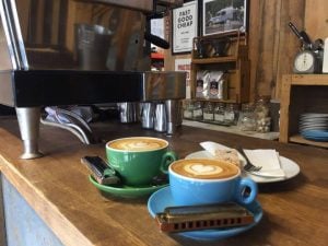 Flat whites and harmonicas in a speciality coffee shop