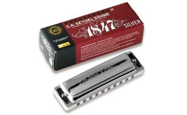 Silver harmonica on sale